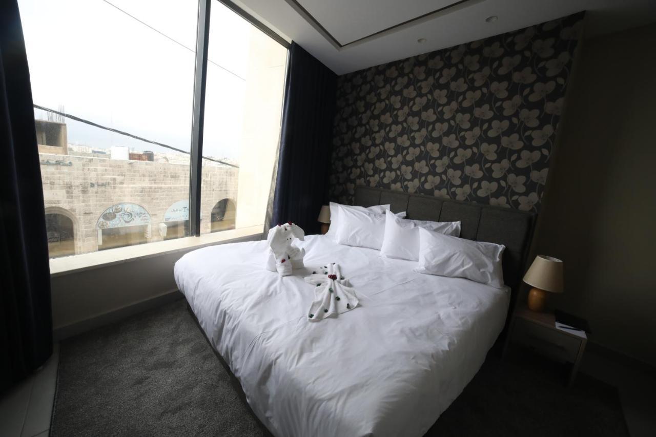 فندق صحارى الخليج Sahara Gulf Hotel Apartments Amman Exteriör bild
