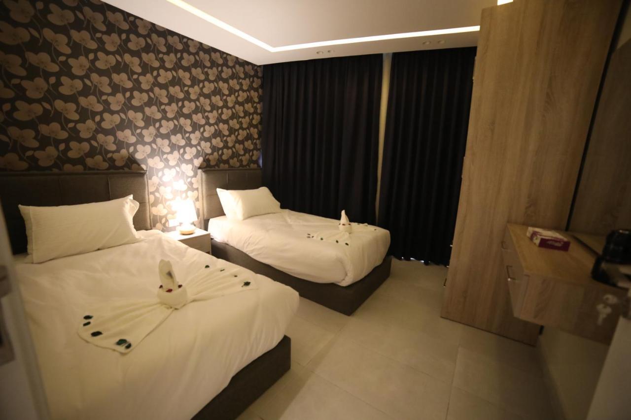 فندق صحارى الخليج Sahara Gulf Hotel Apartments Amman Exteriör bild